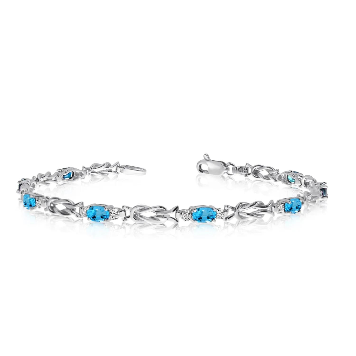 14K White Gold Oval Blue Topaz Stones And Diamonds Tennis Bracelet, 7"