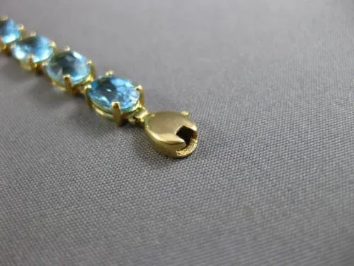 ESTATE LARGE 8.0CT AAA OVAL BLUE TOPAZ 14KT YELLOW GOLD 4 PRONG TENNIS BRACELET