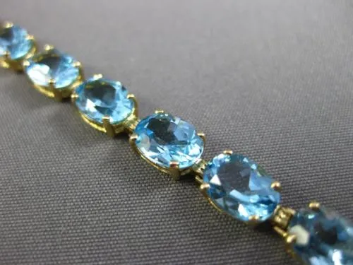 ESTATE LARGE 8.0CT AAA OVAL BLUE TOPAZ 14KT YELLOW GOLD 4 PRONG TENNIS BRACELET