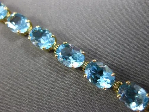 ESTATE LARGE 8.0CT AAA OVAL BLUE TOPAZ 14KT YELLOW GOLD 4 PRONG TENNIS BRACELET