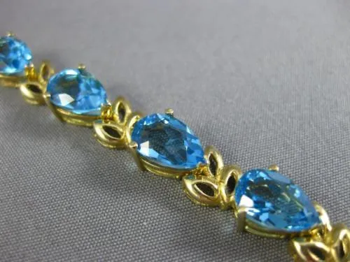 ESTATE WIDE & LONG 14CT AAA BLUE TOPAZ 14KT YELLOW GOLD 3D LEAF TENNIS BRACELET