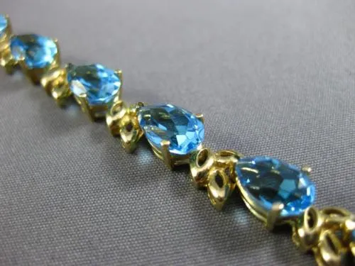 ESTATE WIDE & LONG 14CT AAA BLUE TOPAZ 14KT YELLOW GOLD 3D LEAF TENNIS BRACELET