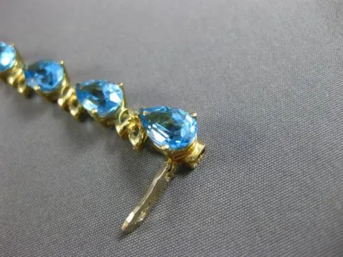 ESTATE WIDE & LONG 14CT AAA BLUE TOPAZ 14KT YELLOW GOLD 3D LEAF TENNIS BRACELET