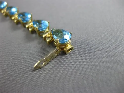 ESTATE WIDE & LONG 14CT AAA BLUE TOPAZ 14KT YELLOW GOLD 3D LEAF TENNIS BRACELET