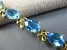 ESTATE WIDE & LONG 14CT AAA BLUE TOPAZ 14KT YELLOW GOLD 3D LEAF TENNIS BRACELET