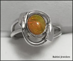 Ethiopian Opal in 14kt Bezel w/ Two Rowing Blades Ring