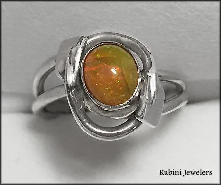 Ethiopian Opal in 14kt Bezel w/ Two Rowing Blades Ring