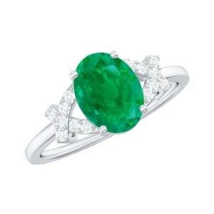 Split Shank Oval Emerald and Diamond Solitaire Engagement Ring